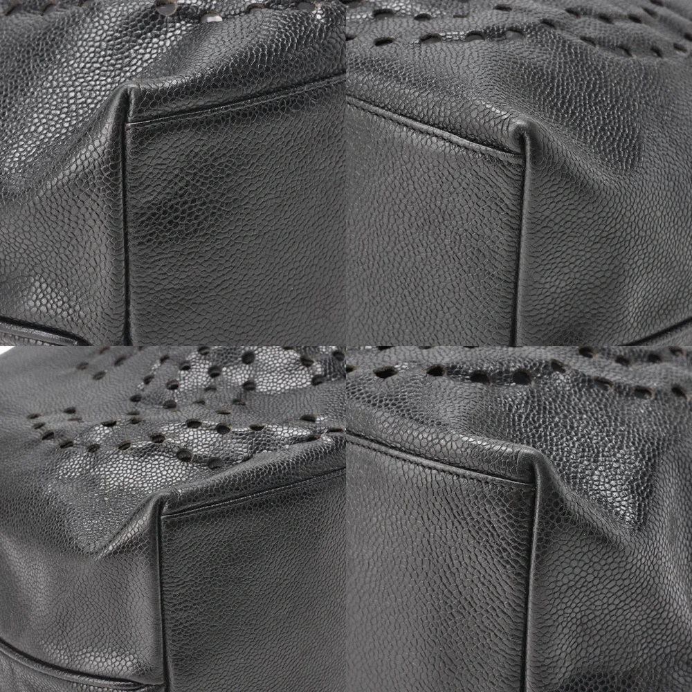 Authentic CHANEL Black caviar perforated bucket drawstring with removable pouch